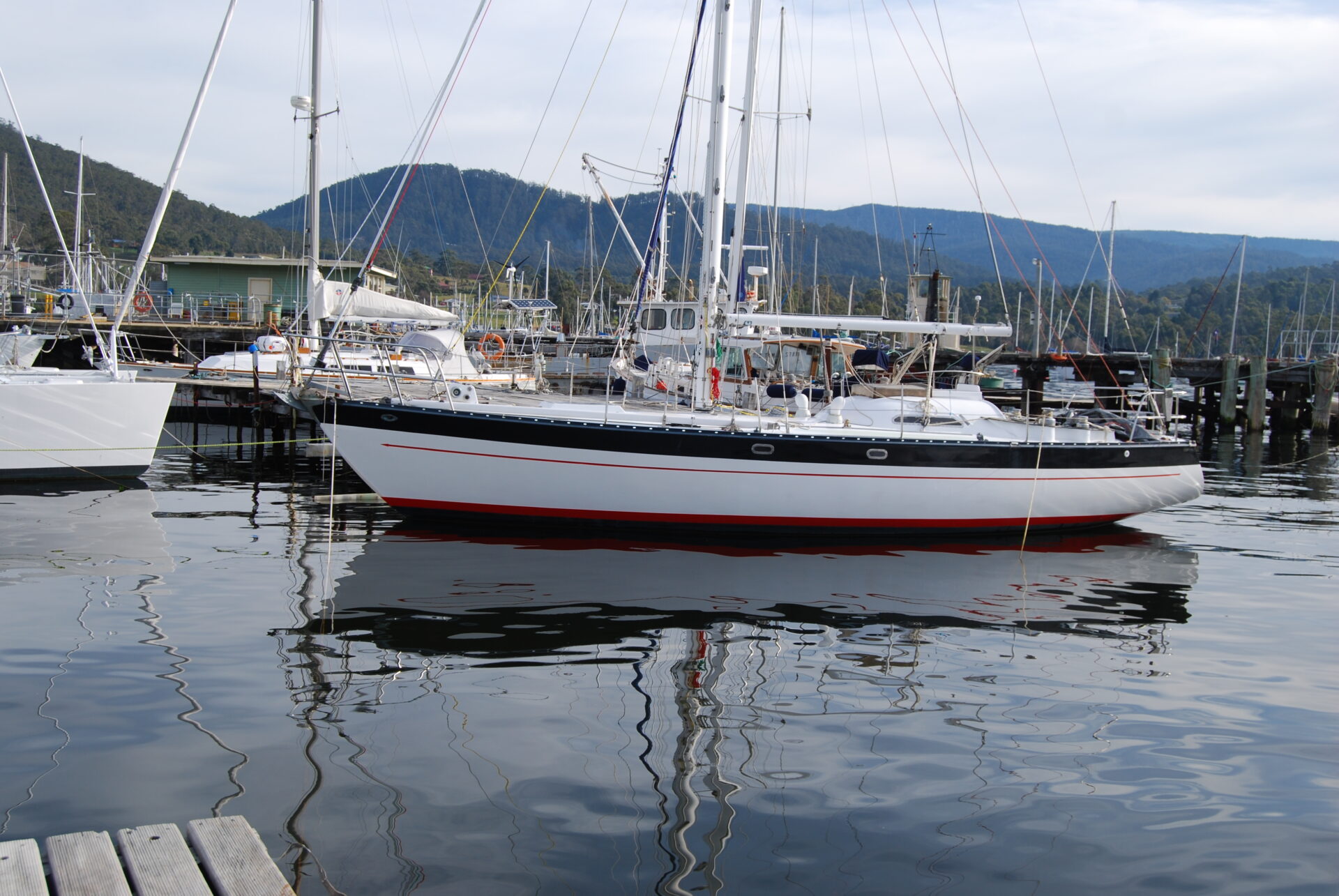 Professional boat painting at Able Marine Shipwrights Kettering Tasmania